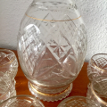 licorera en cristal tallado con borde dorado y 6 vasos
